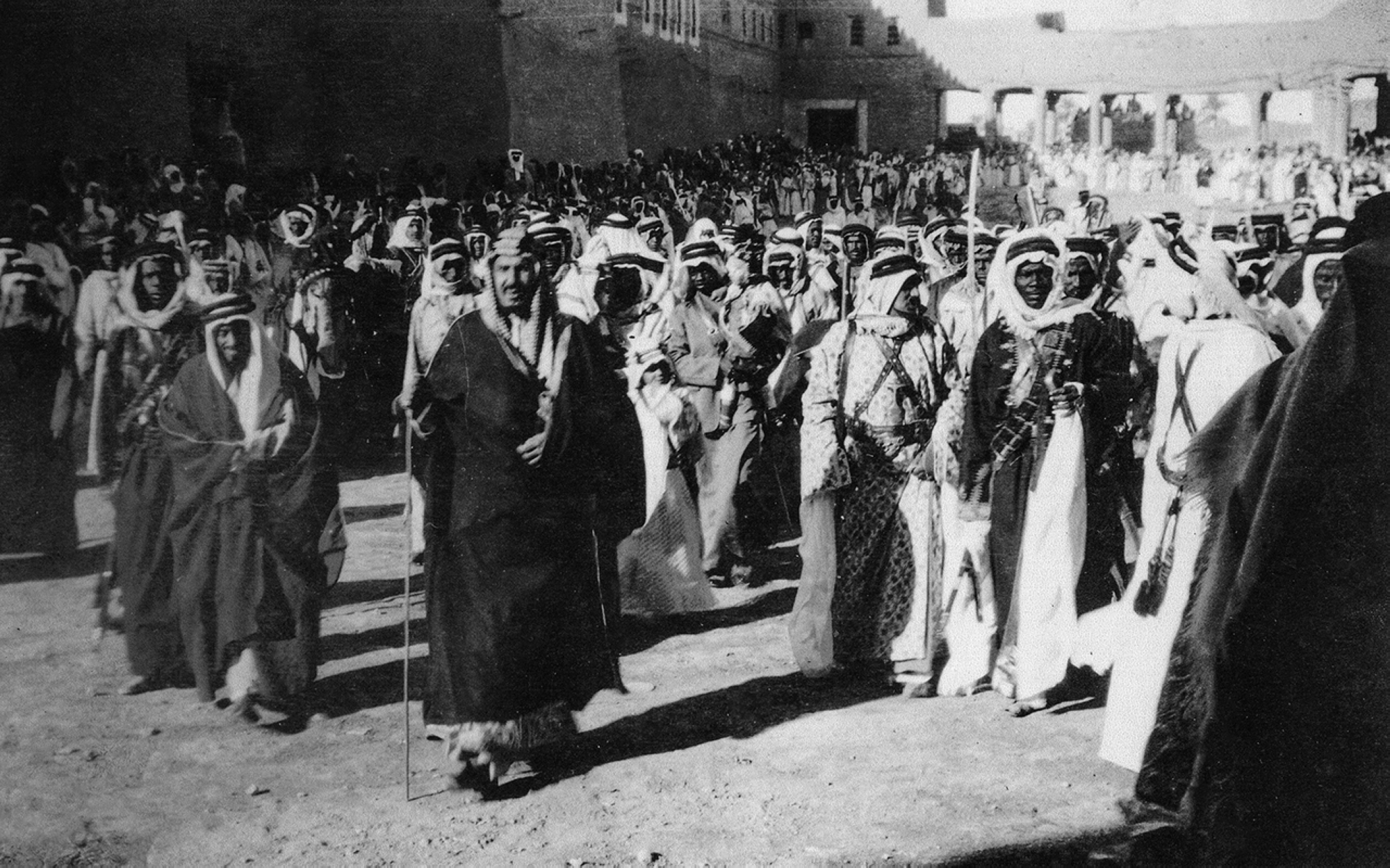 King Abdulaziz in the courtyard of al-Hukm Palace during the Eid al-Fitr celebration in 1935. King Abdulaziz Foundation for Research and Archives (Darah)