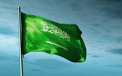 The Saudi flag is referred to as the green banner in the Saudi national anthem. (King Abdulaziz Foundation)