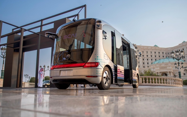 An electric car in front of the Ritz-Carlton Hotel in Riyadh (SPA).