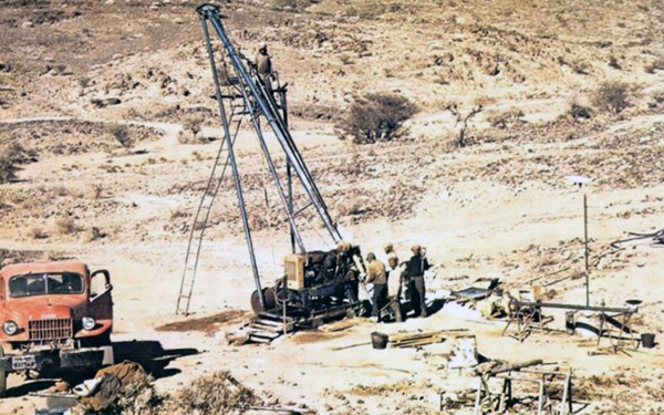 An old picture showing gold mining activities. Darah Foundation