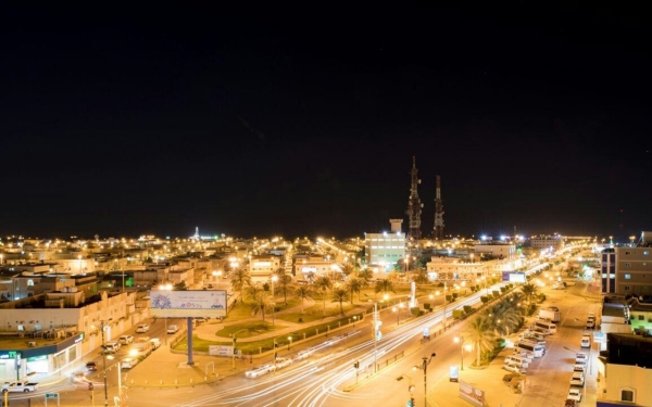 Nighttime aerial image of Abqaiq Governorate. (SPA) (King Abdulaziz Foundation for Research and Archives)