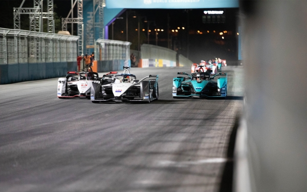 Race cars competing in Diriyah Formula E. (SPA).