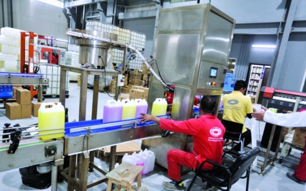 Production and packaging line for cleaning materials in a chemical factory in the Kingdom. King Abdulaziz Foundation for Research and Archives (Darah)