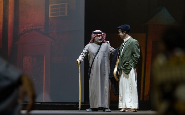 A picture of a theatrical performance showing actors performing their roles. (Darah)