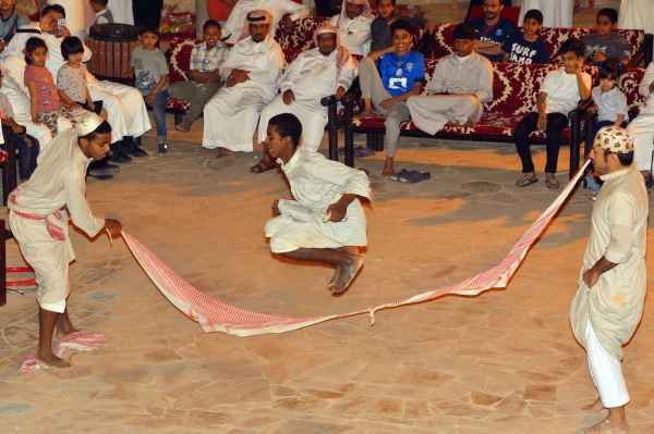 A group of children playing the traditional Shabra Qamra game. (SPA)