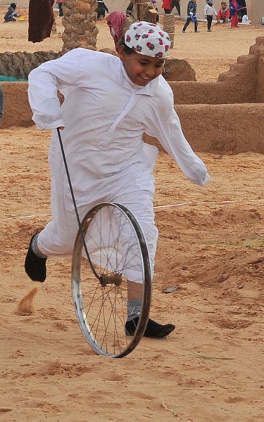 A child playing the game of Dananah. (SPA)