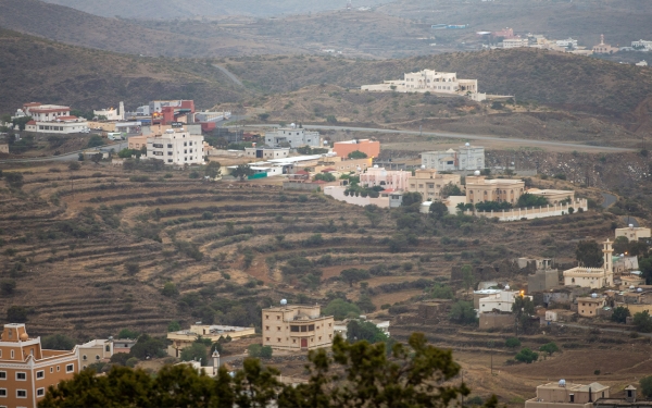 One of the villages on the outskirts of Abha City, and the agricultural terraces are visible. (Saudipedia)