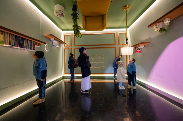 Children intrigued at the Riyadh International Book Fair. (Media Center of the Literature, Publishing, and Translation Commission)