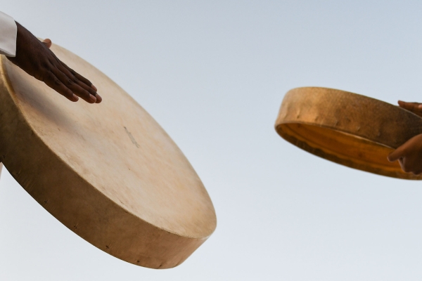 The Naqouz dance is performed by two rows of dancers with drummers holding tambourines of various sizes positioned in the middle. (Shutterstock)