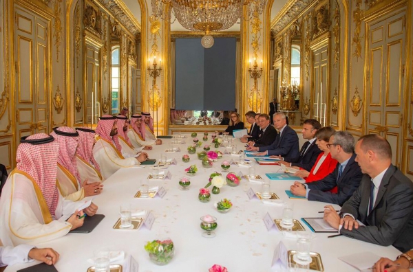 Crown Prince Mohammed Bin Salman meets with French President Macron. (SPA)