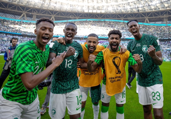 The Saudi national team players celebrate their victory against Argentina. (Saudi Arabian Football Federation)