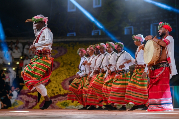 A group performing the Azawi Dance at an event. (Heritage Commission)