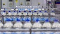 Preparing Zamzam water bottles at the filling plant in Makkah al-Mukarramah. (SPA)