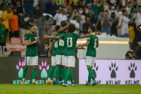 The Saudi national team players celebrating after scoring against Russia in the FIFA World Cup 2022. (Saudipedia)