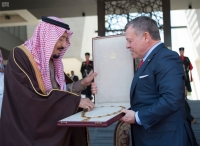 King Salman Bin Abdulaziz while being presented with Order of al-Hussein Bin Ali. (SPA)