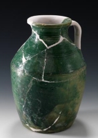 A ceramic jar made of yellow pottery. (Saudi Commission for Tourism and Antiquities)
