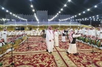 Al-Hawti art is performed by lining up the performers in a straight line in two facing rows. (Unayzah Heritage Society)