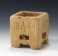 Square-shaped censer carved from limestone. (Saudi Commission for Tourism and Antiquities)