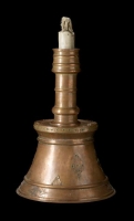 copper candlestick artifact. (Saudi Commission for Tourism and Antiquities)