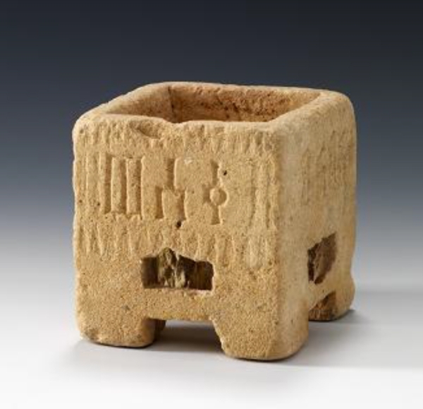 Square-shaped censer carved from limestone. (Saudi Commission for Tourism and Antiquities)