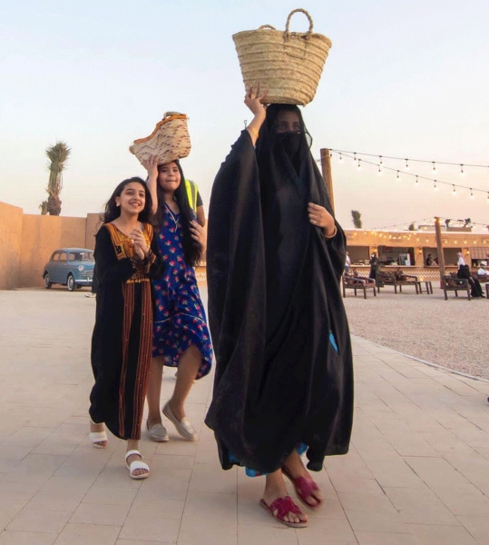 Wearing traditional female garments at one of the festivals in Saudi Arabia. (SPA)