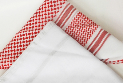 The Shemagh is distinguished by square patterns embroidered in red, while the Ghutra is a white, square-shaped cotton scarf. (Shutterstock)