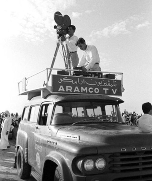 An Aramco television vehicle with cameramen and equipment on its roof. (King Abdulaziz Foundation)