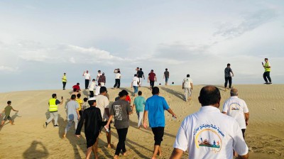 فعالية المشي على الرمال بتنظيم جمعية مشاة وهايكنج جازان. (المركز الإعلامي للجمعية)